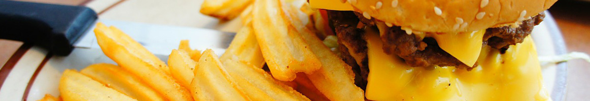 Eating American (Traditional) Burger Chicken at Flippin' Good Chicken, Burgers, Beer restaurant in Las Vegas, NV.